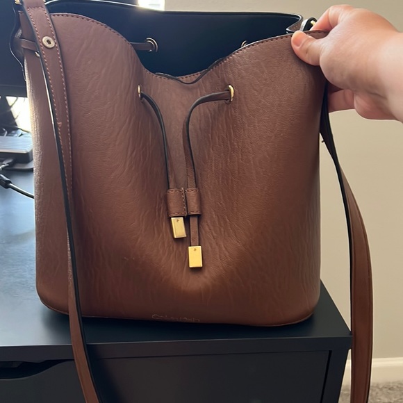 Calvin Klein Handbags - Calvin Klein Brown Faux Leather Bucket Bag